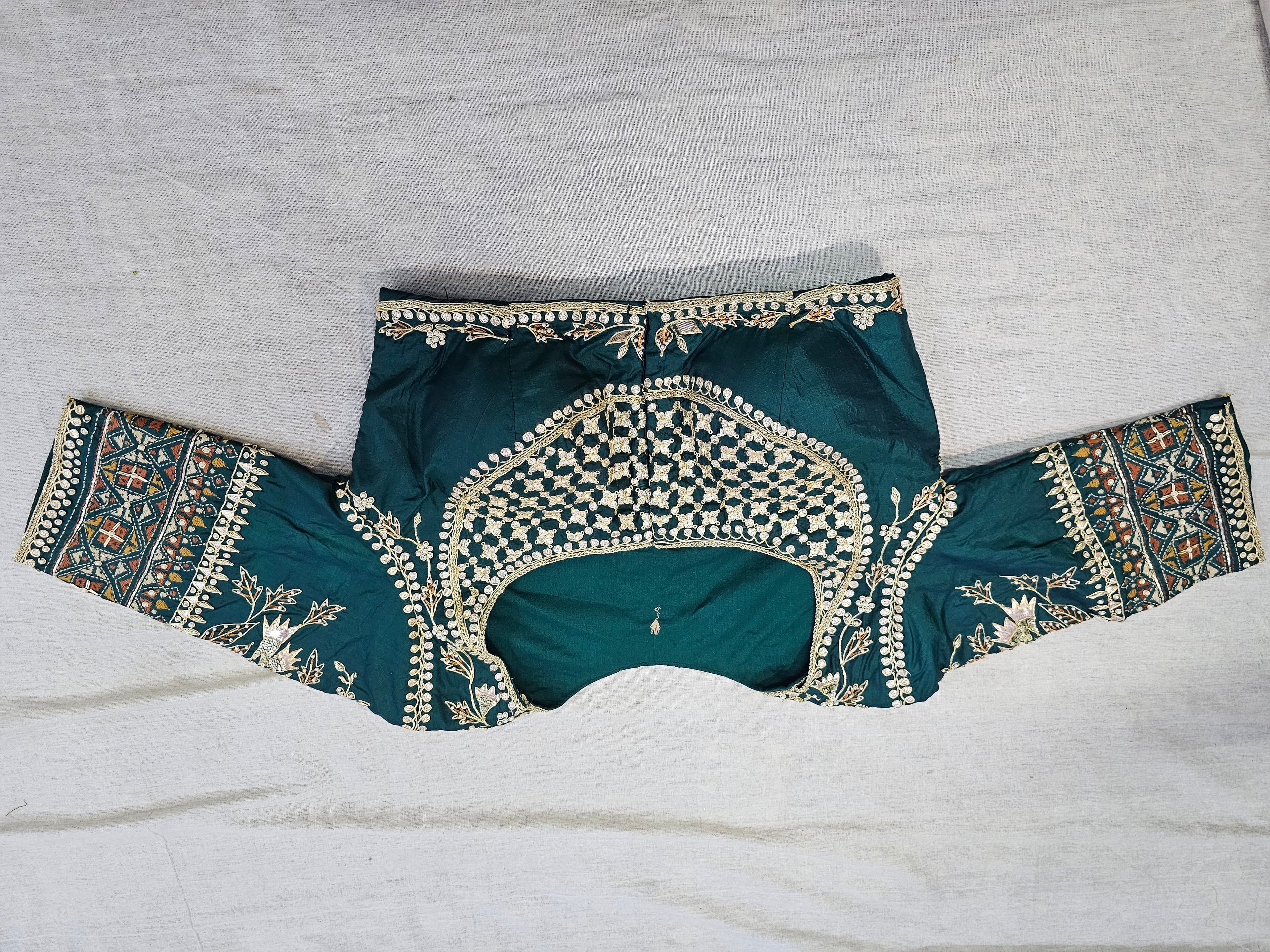 Detailed embroidery craftsmanship by Shah Vastra Creations